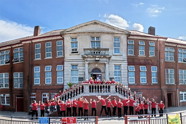 Kids in front of high school